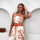 Ensemble haut à bretelles et pantalon large à fleurs tendance