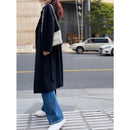 Manteau de transport en cachemire à manches raglan et effet ondulé