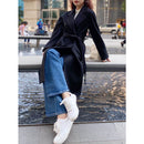 Manteau de transport en cachemire à manches raglan et effet ondulé